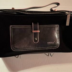 Montreal designers Matt & Nat black with pink piping, top handle bag.